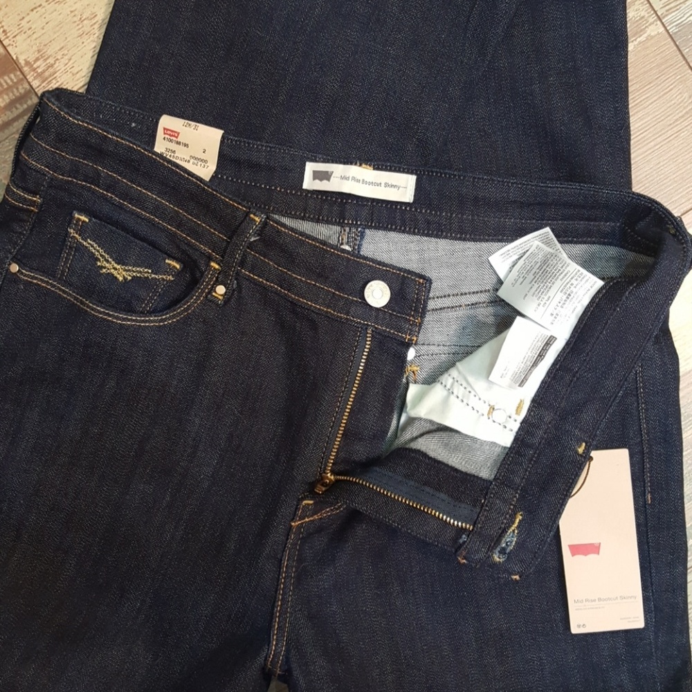 Levis Mid Rise Boot Cut Skinny Jeans 12 M 31